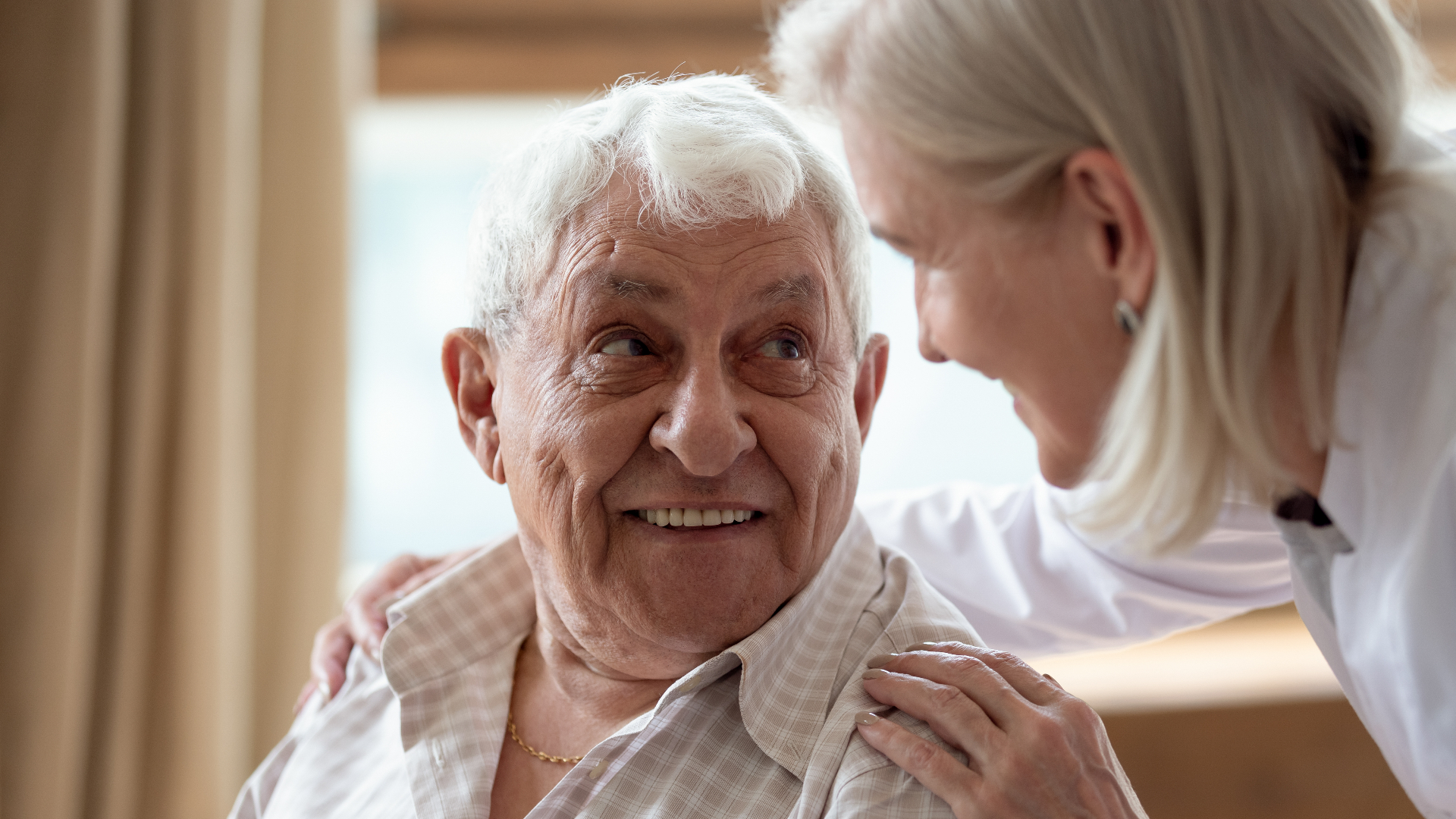 Caregiver supporting elderly resident